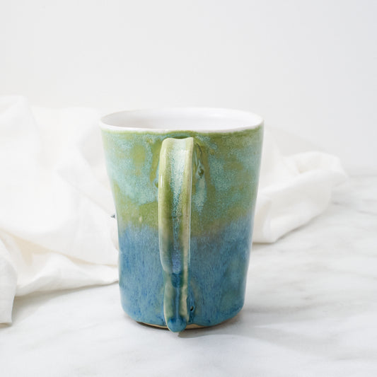 White Silkie mug, green-blue glaze