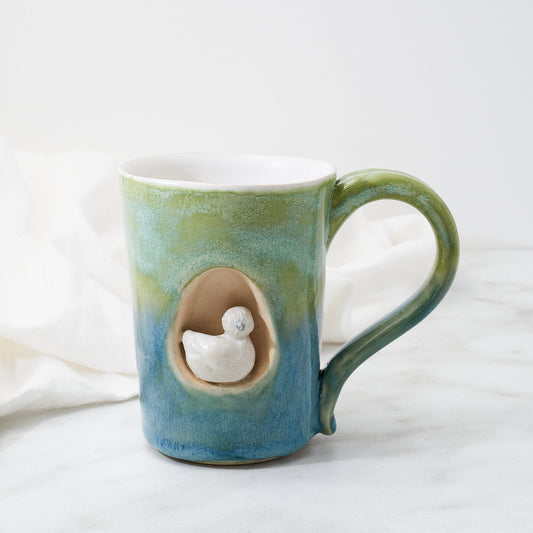 White Silkie mug, green-blue glaze