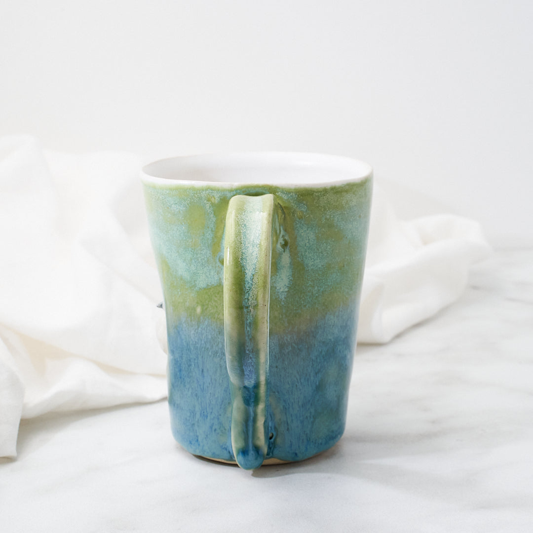White Silkie mug, green-blue glaze