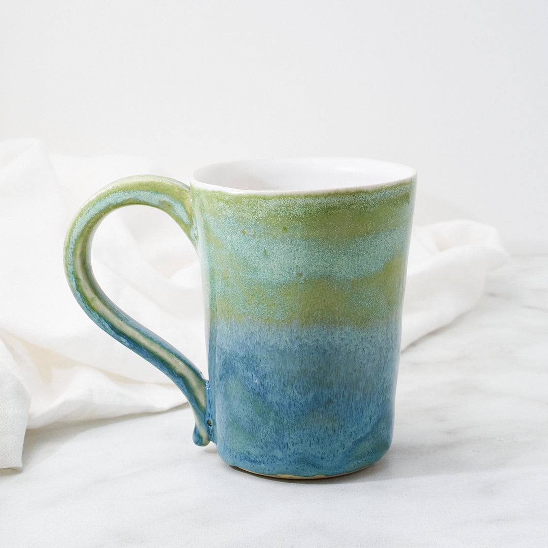 White Silkie mug, green-blue glaze