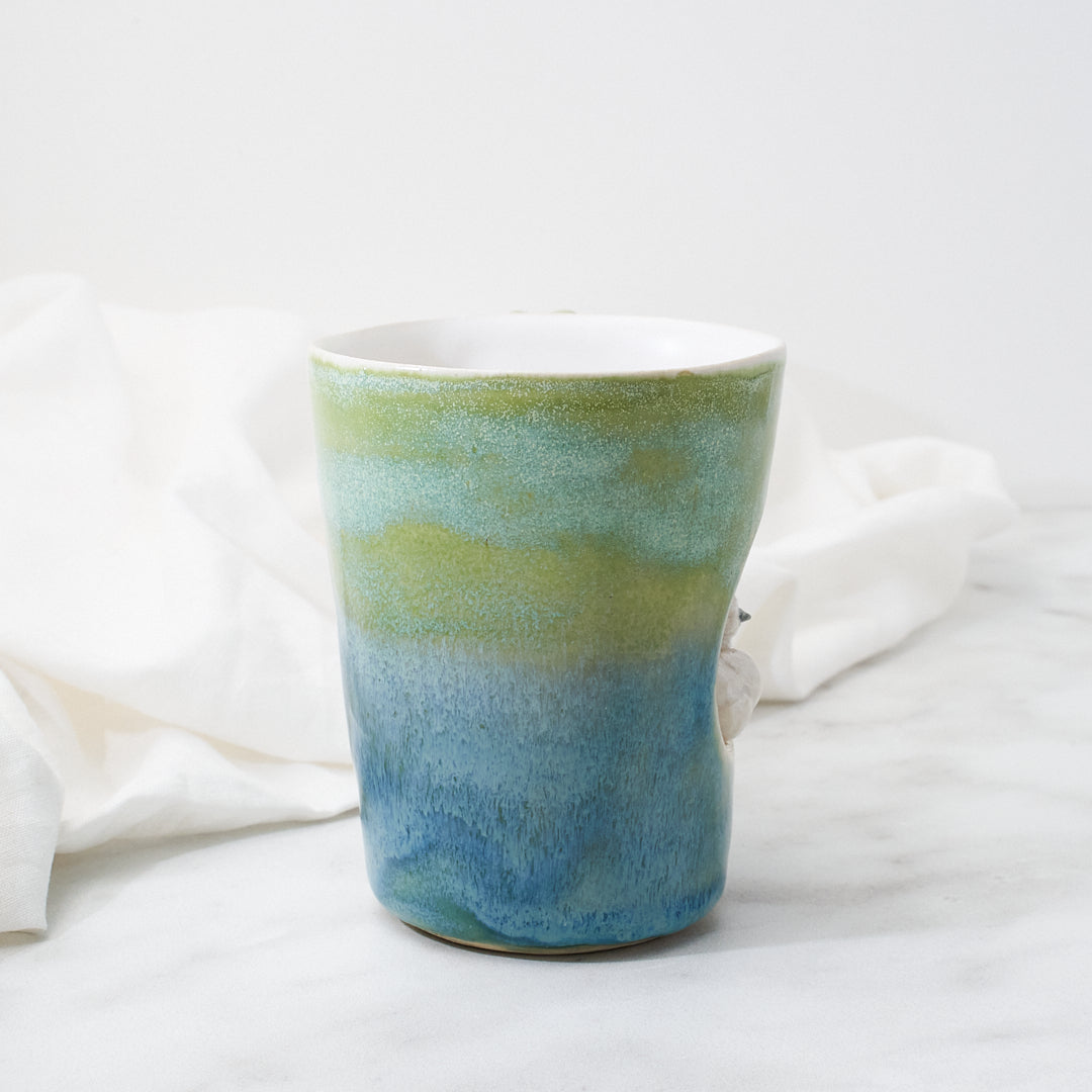 White Silkie mug, green-blue glaze