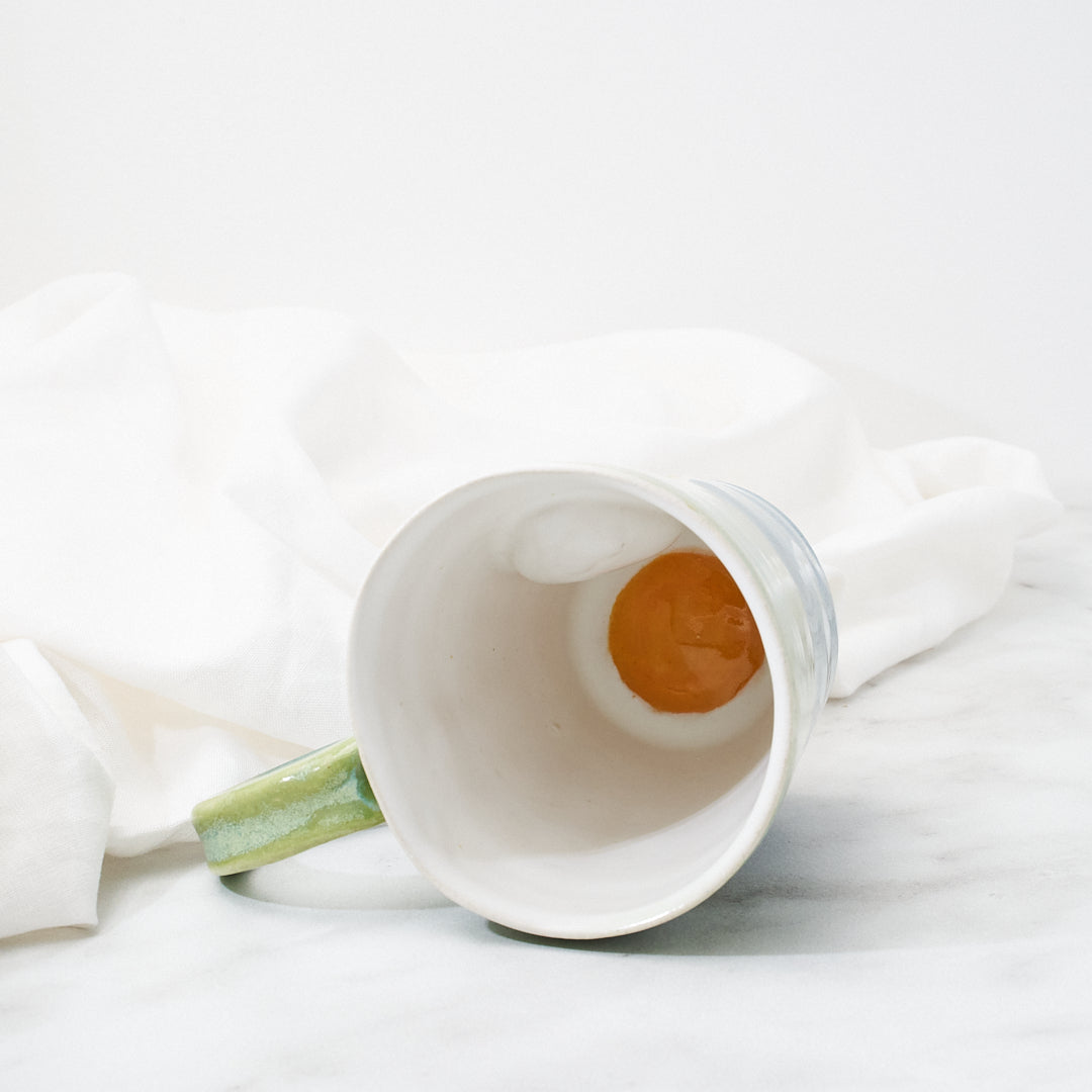 White Silkie mug, green-blue glaze