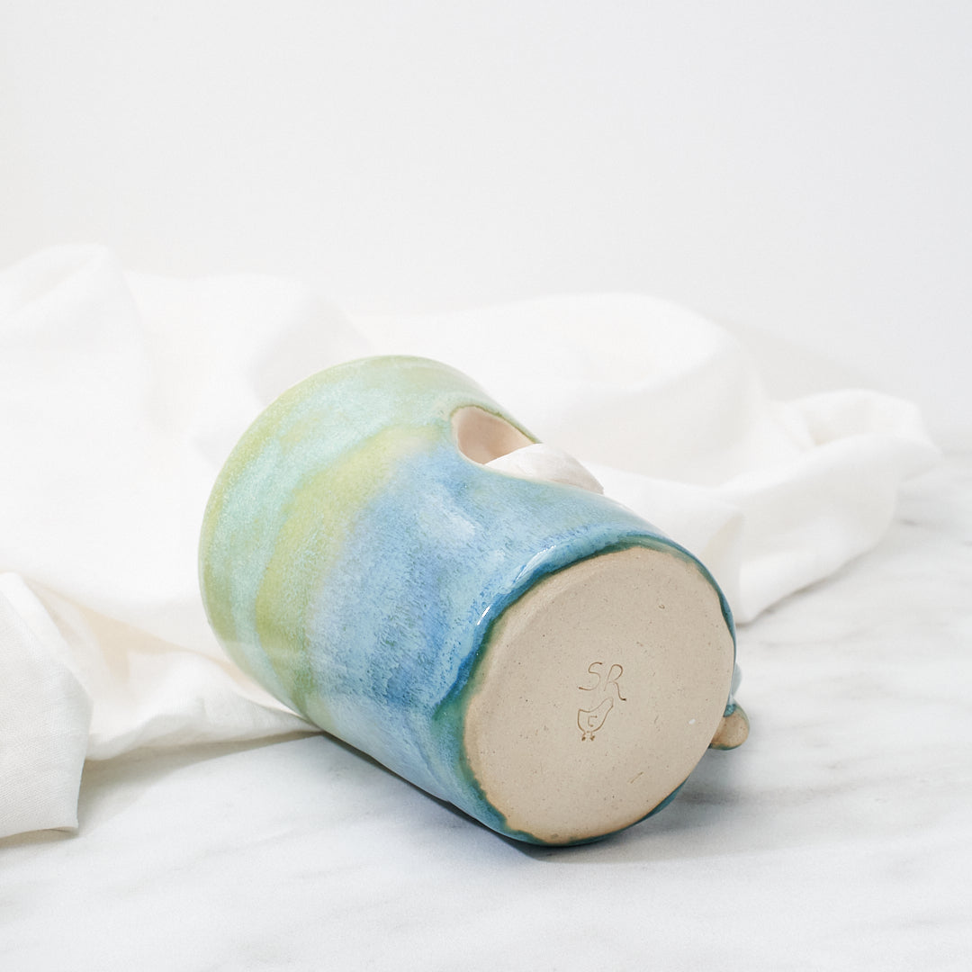 White Silkie mug, green-blue glaze