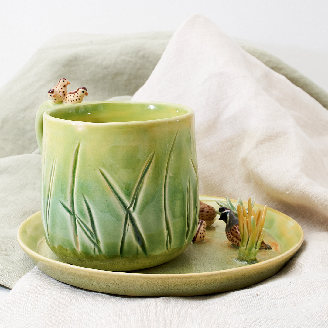 Quail family cup and saucer - little explorer