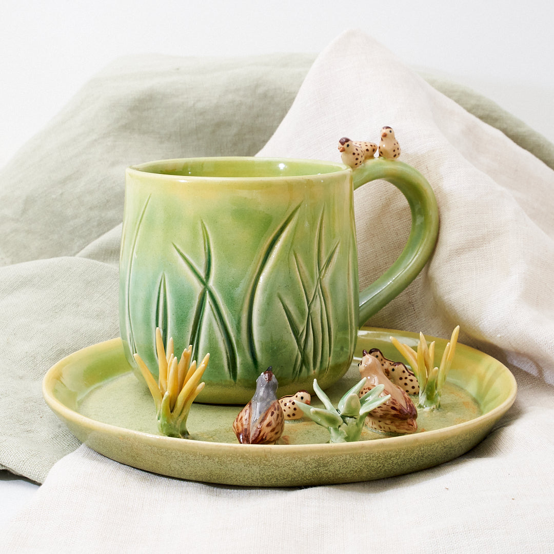 Quail family cup and saucer - little explorer