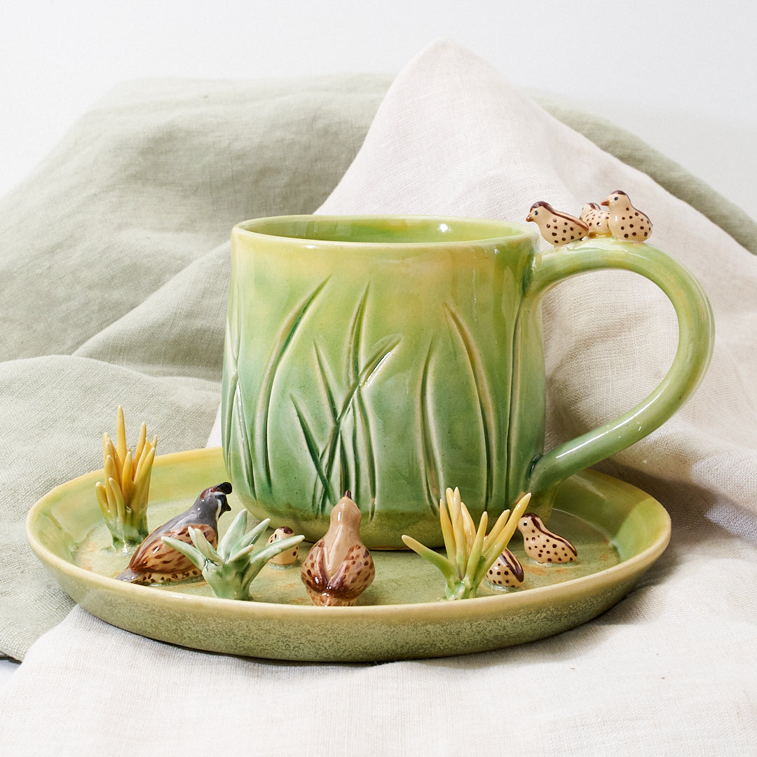 Quail family cup and saucer - little explorer
