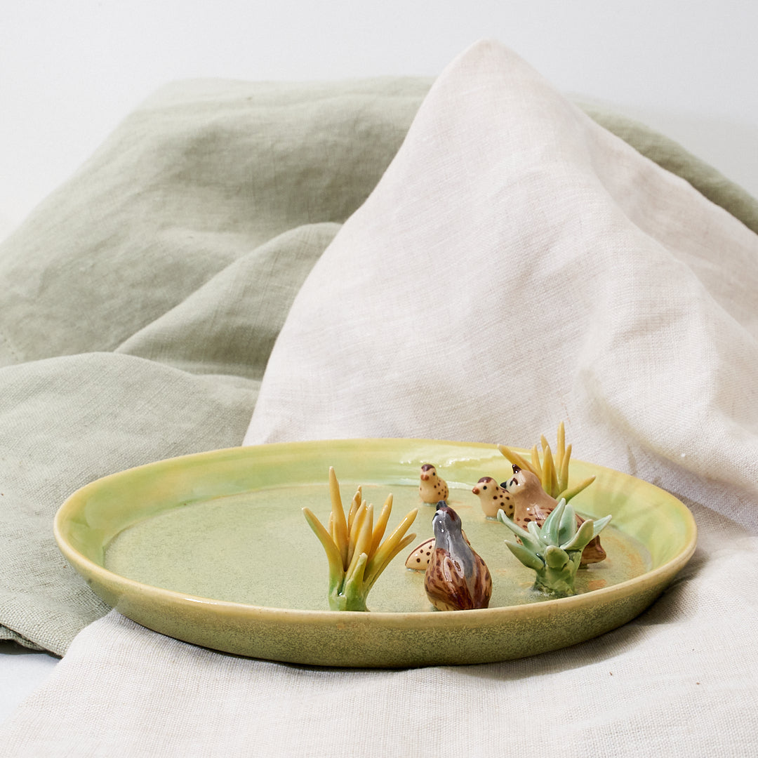 Quail family cup and saucer - little explorer