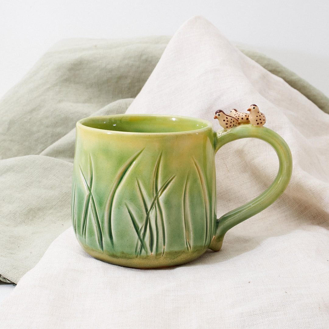 Quail family cup and saucer - little explorer