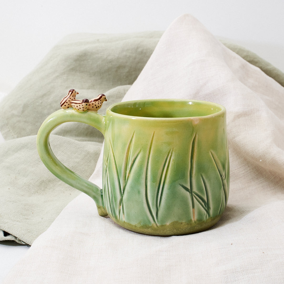 Quail family cup and saucer - little explorer