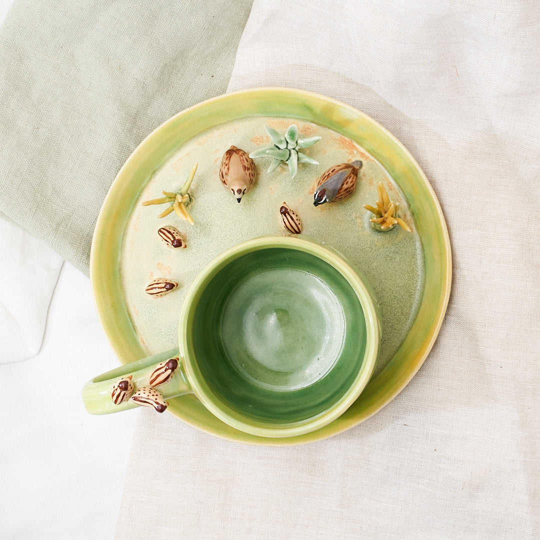 Quail family cup and saucer - little explorer