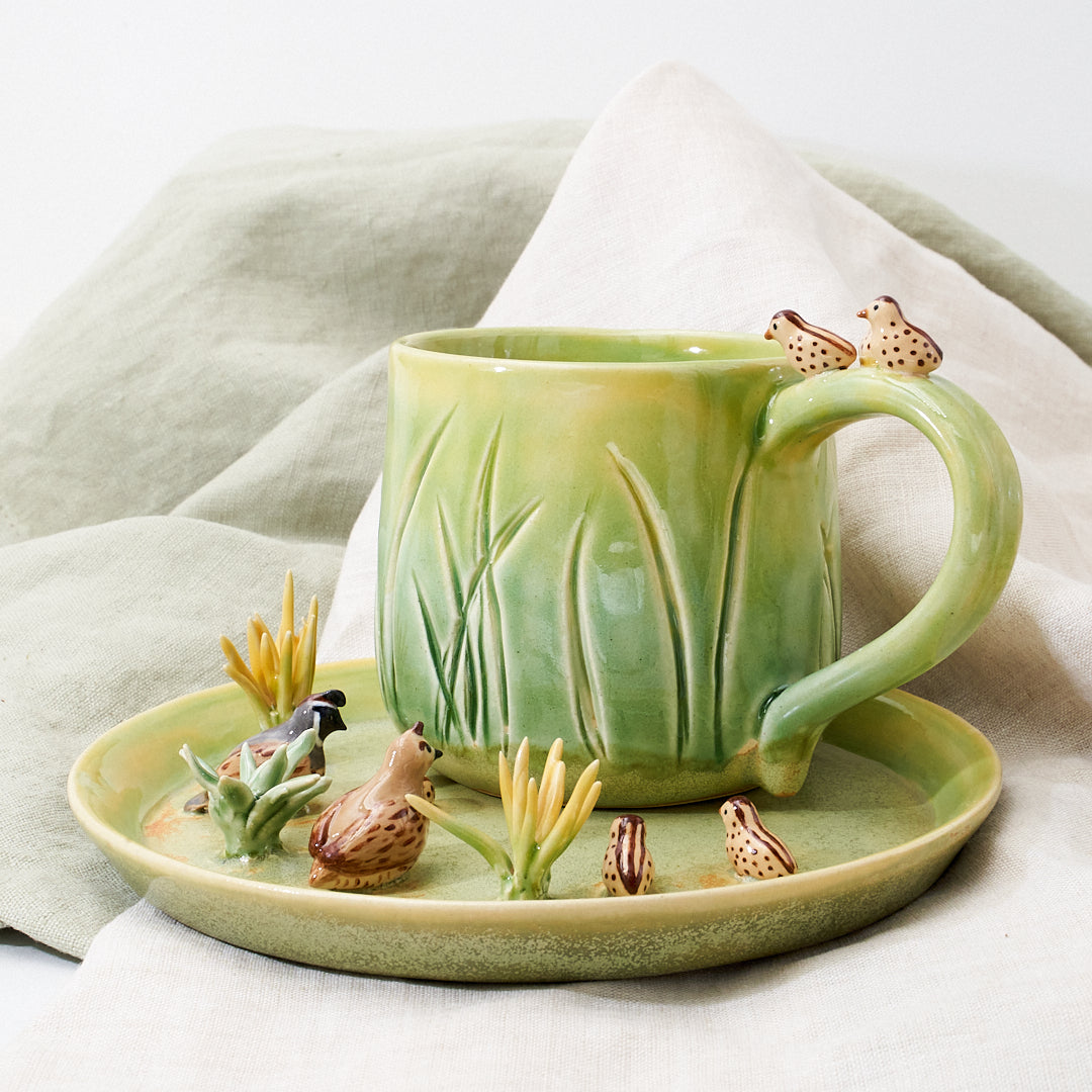 Quail family cup and saucer - little explorer