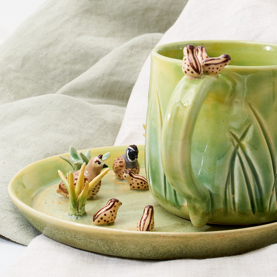Quail family cup and saucer - little explorer