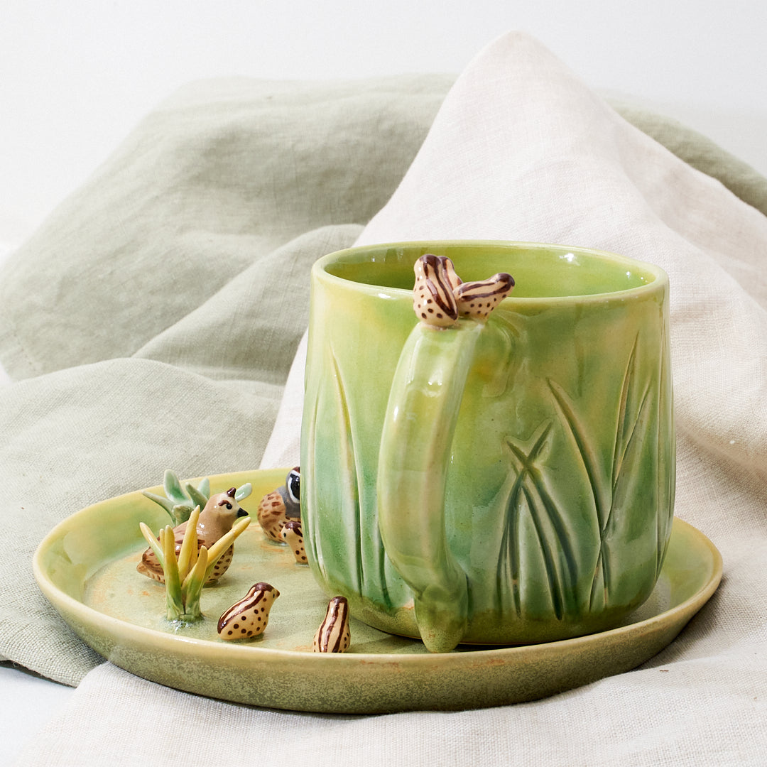 Quail family cup and saucer - little explorer